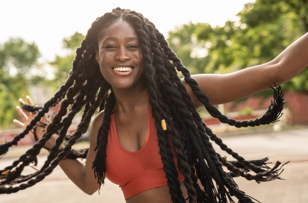 Playful girl in jumbo twist braids 