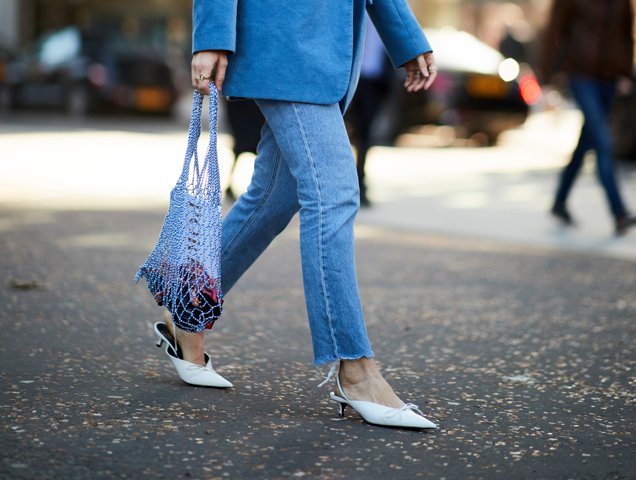 white V-cut shoes outside the Fall 2018 shows in London