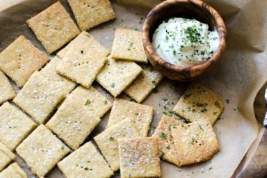 Nooch Crackers sprinkled with nutritional yeast, recipe by Bob's Red Mill