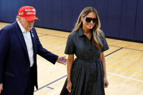 Republican presidential nominee former President Donald Trump escorts his wife Melania Trump at the polling place in the Morton and Barbara Mandel Recreation Center on Election Day, on November 05, 2024 in Palm Beach, Florida.